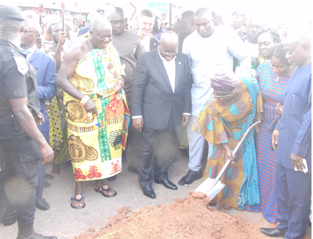 •	Hajia Alima Mahama, Local Government Minister, takes her turn in the sod cutting